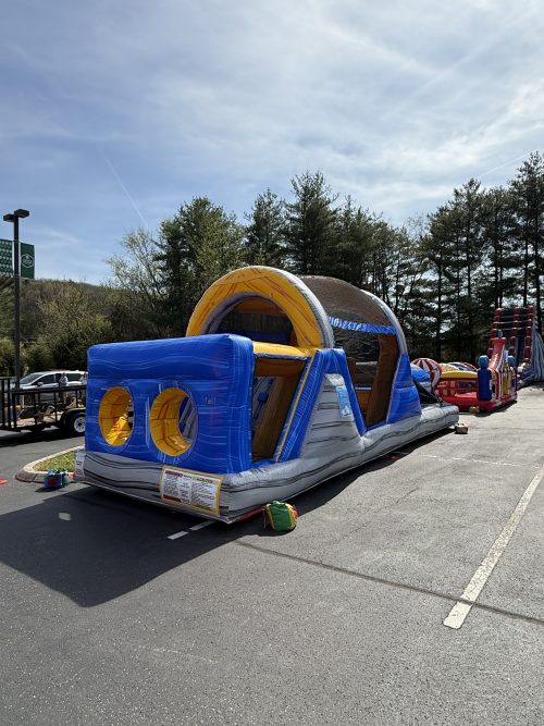 Inflatable bounce house and slide rental for kids' parties and events. Perfect for outdoor fun and e.